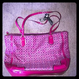 Purple and pink coach purse